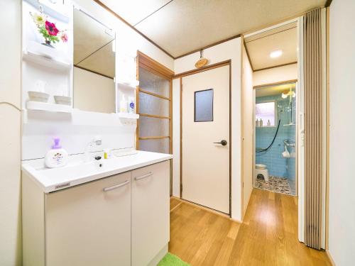 a bathroom with a white sink and a toilet at Kokoyui - Vacation STAY 06794v in Shimosato