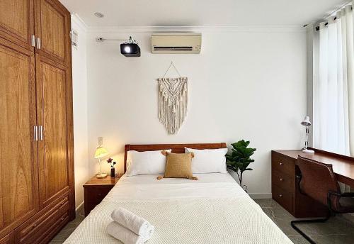 Ένα ή περισσότερα κρεβάτια σε δωμάτιο στο Rù Rì Homestay