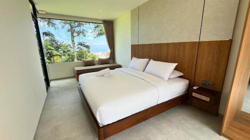 Postel nebo postele na pokoji v ubytování Villa Alba Uno Heated Pool Lembang Bandung