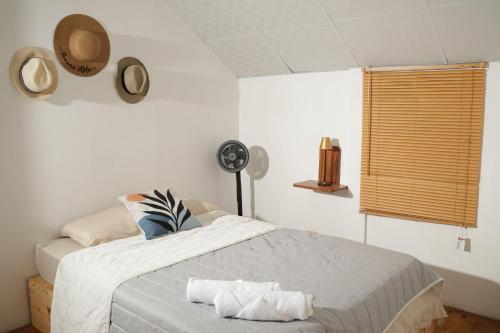 Ένα ή περισσότερα κρεβάτια σε δωμάτιο στο Novus Stay Boquete