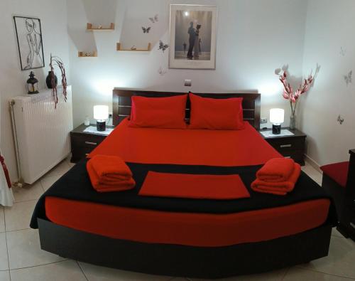 Een bed of bedden in een kamer bij RnB Red&Black