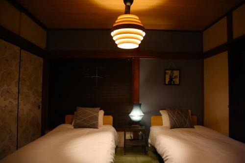 6 Min Walk from Aoto Station, Direct Access to Narita, Haneda Airports, Old house with modern renovation,