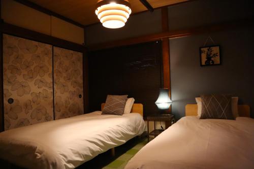 6 Min Walk from Aoto Station, Direct Access to Narita, Haneda Airports, Old house with modern renovation,
