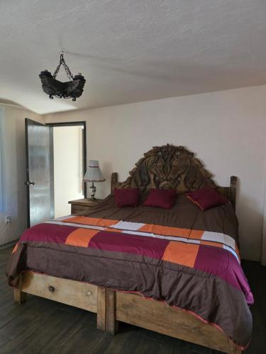 Postel nebo postele na pokoji v ubytování Acogedora casa de campo en Rancho la Cruz