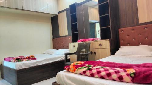 Ένα ή περισσότερα κρεβάτια σε δωμάτιο στο SVR home stays