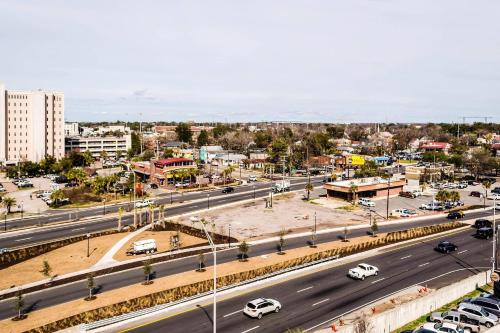 an aerial view of a city with a highway at Comfort Inn Downtown Charleston in Charleston