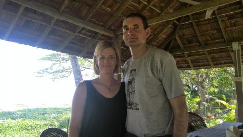 a man and a woman posing for a picture at Lovedale Lakeside Homestay in Alleppey