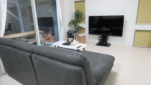 Et tv og/eller underholdning på Villa Coast 南九十九里