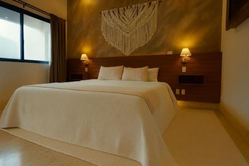 Postel nebo postele na pokoji v ubytování El Secreto de Valle