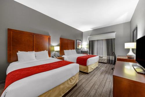 Postel nebo postele na pokoji v ubytování Comfort Inn Kearney I-80