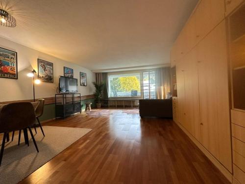 Μια τηλεόραση ή/και κέντρο ψυχαγωγίας στο Alpine Hideaway - Cozy Mountainview Studio, Free Parking, Ski, Engelberg, Luzern