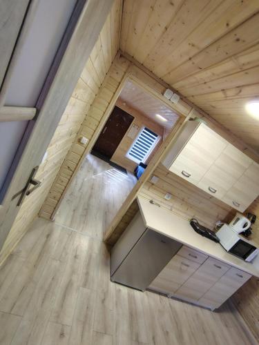 an overhead view of a kitchen in a tiny house at Kolorowe Wzgórze Zagórze in Zagórze Śląskie