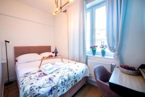 Posteľ alebo postele v izbe v ubytovaní Maya's Flats & Resorts 61 - Love Bridge