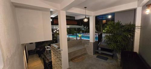 a view of a house with a swimming pool at Sinali Villa in Habaraduwa