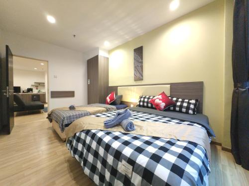 Postel nebo postele na pokoji v ubytování Metra Home 3-5pax MITC Ayer Keroh