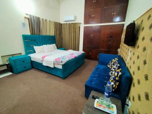 Ένα ή περισσότερα κρεβάτια σε δωμάτιο στο Peridot Cottage