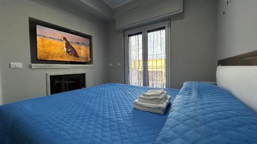 Ένα ή περισσότερα κρεβάτια σε δωμάτιο στο La Casa dello Stretto