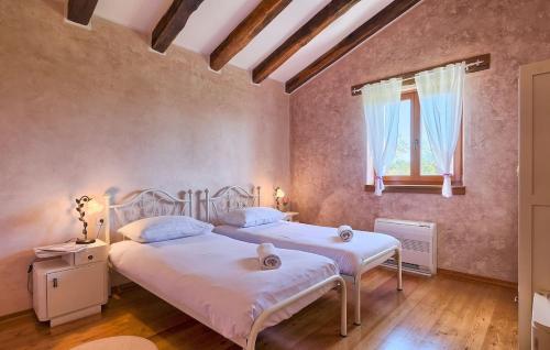 Ένα ή περισσότερα κρεβάτια σε δωμάτιο στο Villa Fiore by Istrialux