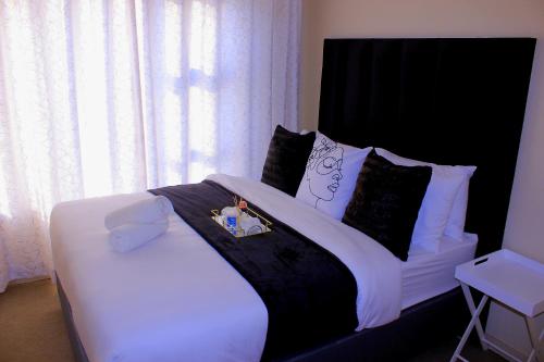 Postel nebo postele na pokoji v ubytování Cozy studio