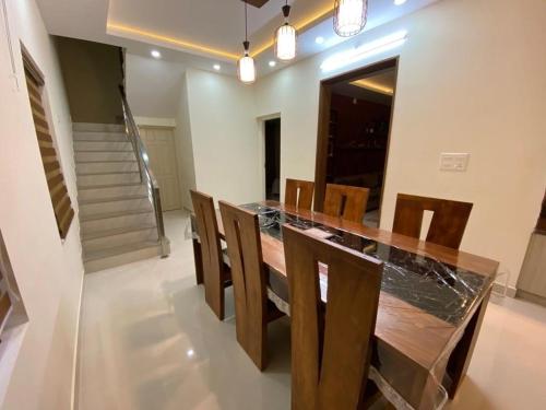 Φωτογραφία από το άλμπουμ του Peaceful Village Retreat in the City-Lavender Villa σε Mūvattupula