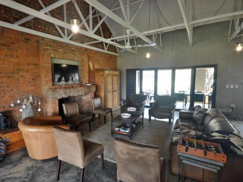Χώρος καθιστικού στο Tula Baba Game Lodge