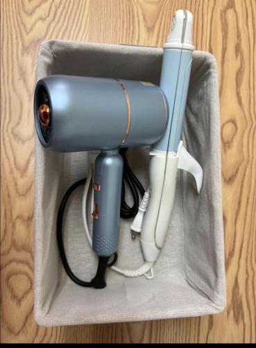 a blow dryer and a phone in a box at 6 minutes to Shinjuku, 10 minutes to Shibuya, accommodating 6 people in Tokyo