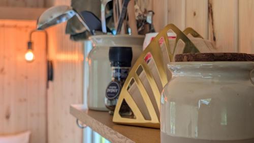 Kuchyň nebo kuchyňský kout v ubytování CRASH'NSTAY Mamaloe Pipowagen