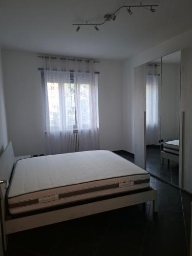 Ένα ή περισσότερα κρεβάτια σε δωμάτιο στο ada negri house