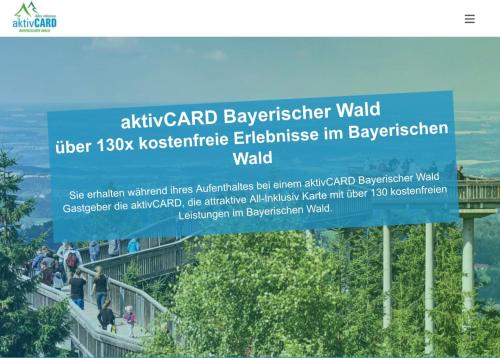 a sign for the amphitheater walk at the sky gardens at App mit Klima, Pool, Garage für Auto, Bike, Skier, AktivCARD optional in Sankt Englmar