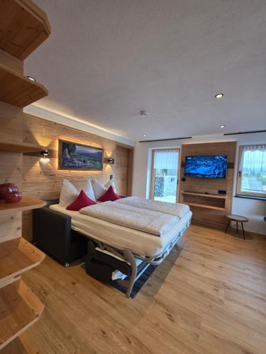 Postel nebo postele na pokoji v ubytování Haus Alpenglück