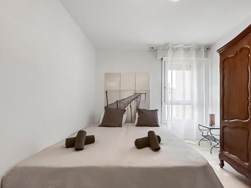 Postel nebo postele na pokoji v ubytování Évasion douce en centre-ville de St-Raphaël