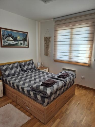 Ένα ή περισσότερα κρεβάτια σε δωμάτιο στο Apartman Predah