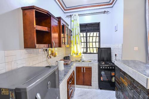 Kuchyň nebo kuchyňský kout v ubytování Peacewell Home