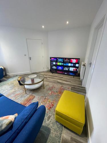 Een TV en/of entertainmentcenter bij Sleaford Luxury Country Stay
