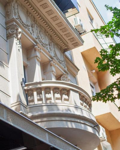a balcony on the side of a building at SAINT TEN Boutique Hotel, Small Luxury Hotels in Belgrade