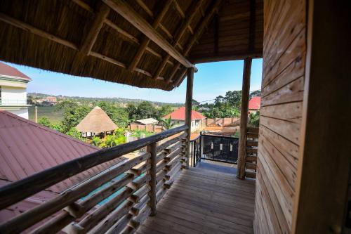 a view from the balcony of a house at Rustic cabin in Masaka