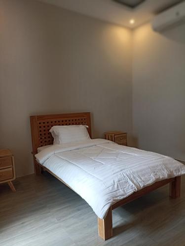 Voodi või voodid majutusasutuse ACE Villa toas