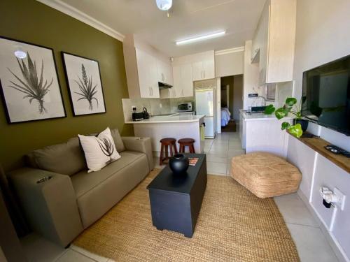 Kuchyň nebo kuchyňský kout v ubytování Aloe Hideaway