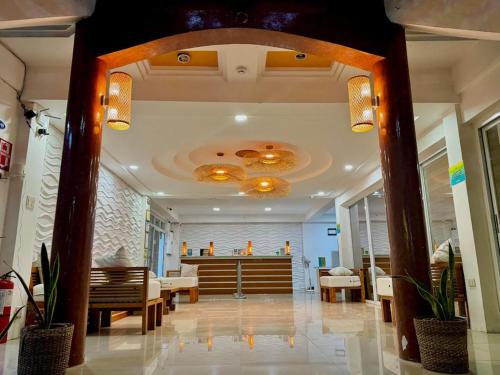 a lobby of a synagogue with a pasteryasteryasteryasteryasteryasteryasteryastery at Sebay Surf Central San Juan La Union in San Juan