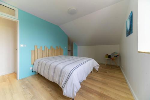 Postel nebo postele na pokoji v ubytování Résidence Penaud - Appartements design et climatisés à la campagne