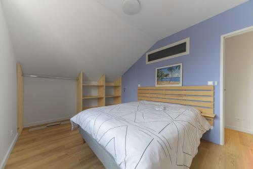 Postel nebo postele na pokoji v ubytování Résidence Penaud - Appartements design et climatisés à la campagne