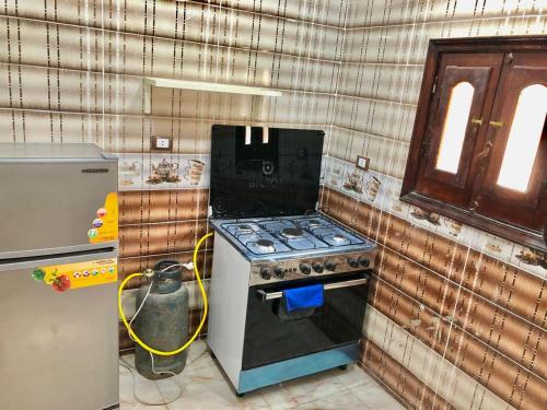 Kuchyň nebo kuchyňský kout v ubytování فندق هرم سيوة - Siwa Pyramid Hotel