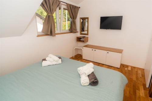 Postel nebo postele na pokoji v ubytování Villa Canolle