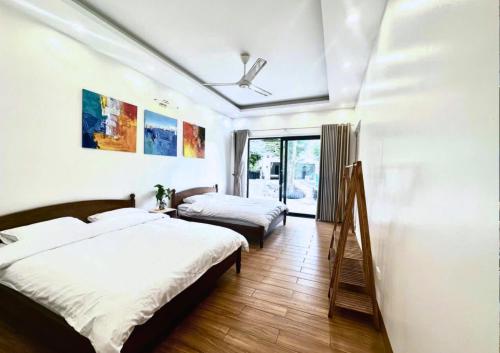 Ένα ή περισσότερα κρεβάτια σε δωμάτιο στο Solmist Villa