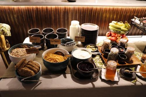 a table topped with bowls of food on a table at House 15 in Kenmare