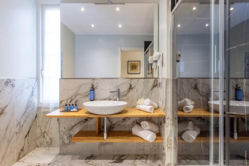 Koupelna v ubytování Hotel Jolanda
