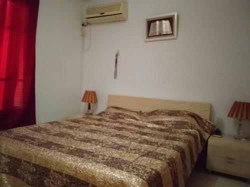 Ένα ή περισσότερα κρεβάτια σε δωμάτιο στο Superbe appartement