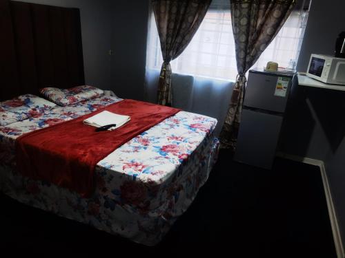 Uma cama ou camas num quarto em Yellow Stars Guesthouses