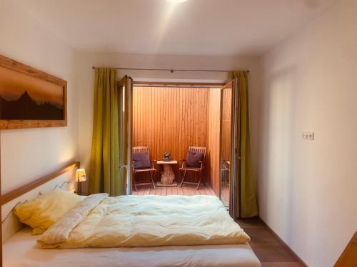 Postel nebo postele na pokoji v ubytování Bergappartement Talblick