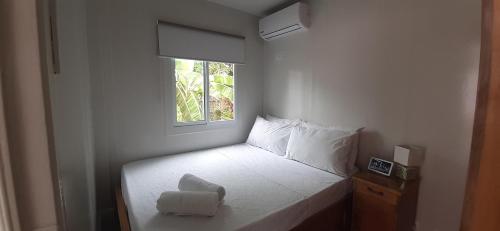 Giường trong phòng chung tại AMResidences